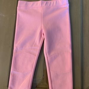 Girls pink leggings with reinforced knee.